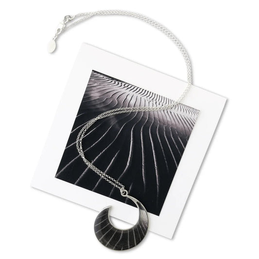 Black Sand Wave Necklace - Allie Richards Photography